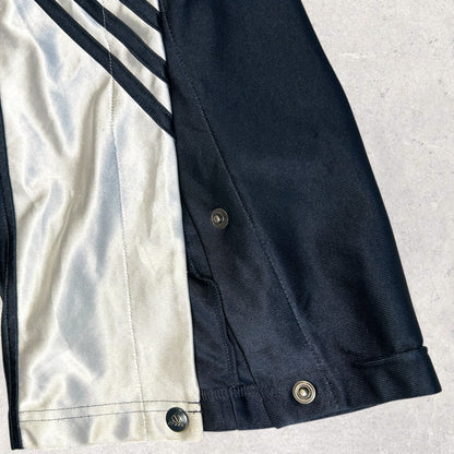 Adidas Verkkari housut (M)